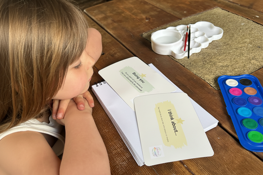 Child exploring identity around adoption life story work, before creatively processing feelings. Wild Hearts Creative