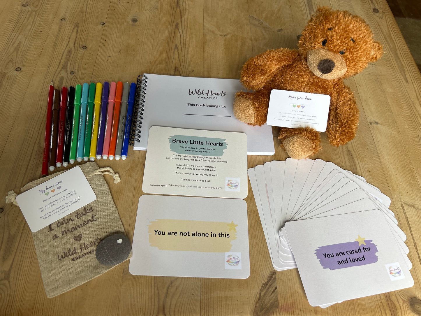 Flat lay childhood illness and disability kit for processing big feelings through creativity, by wild hearts creative