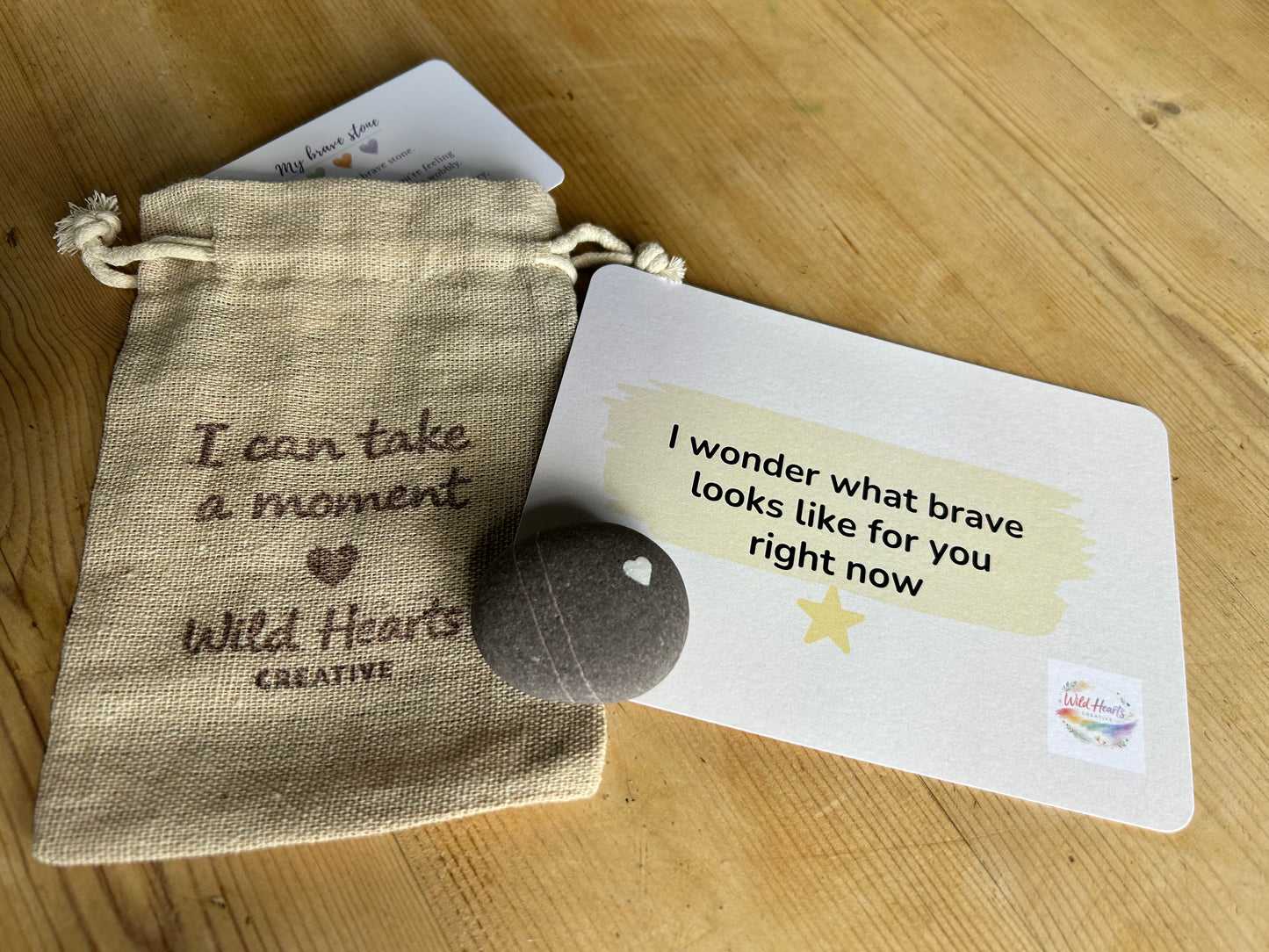Exploring feelings for children going through change, using a comfort stone to ground and creative expression to explore bravery if they are scared