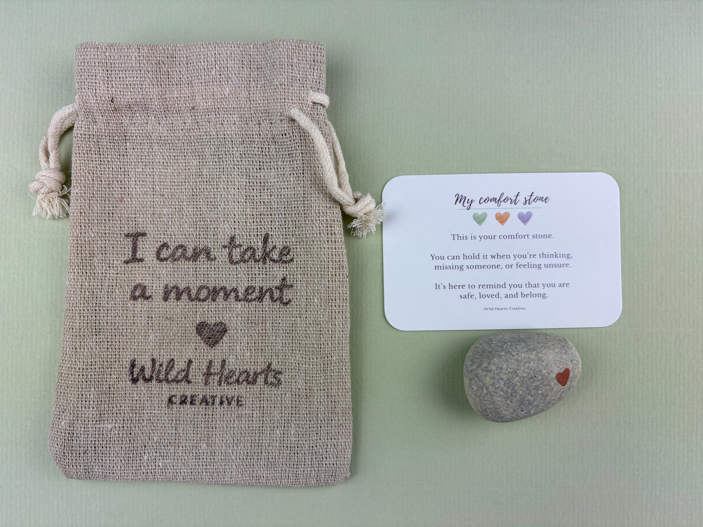 Comfort and reassurance stone for children with branded drawstring pouch and reassurance card, designed to encourage calm, bravery and emotional support.