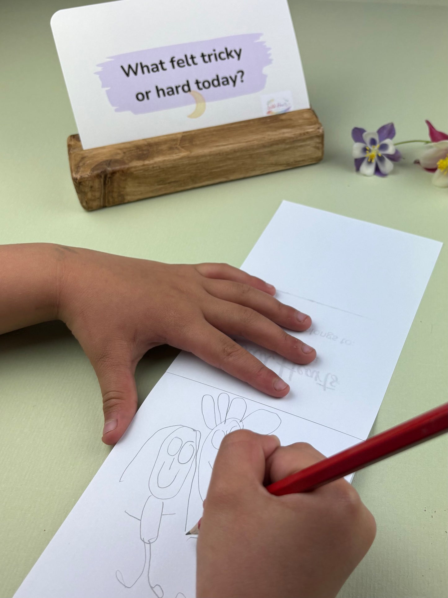 Child exploring feelings using art and creative prompts by wild hearts creative
