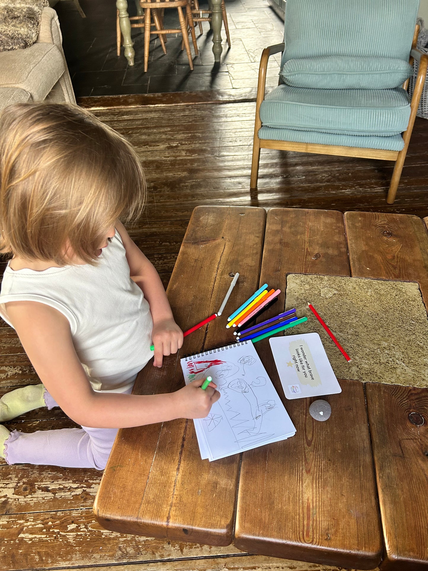 Child drawing what she doesn't have the words for, creative expression by Wild Hearts Creative