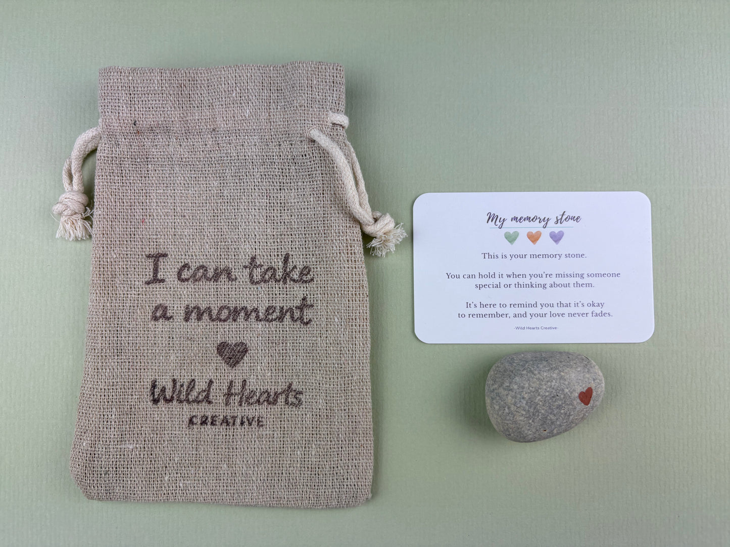 Wild Hearts Creative memory stone with a drawstring pouch and reassurance card, designed to help children remember loved ones and feel comforted while processing grief and loss.