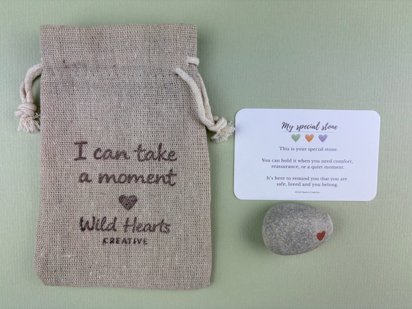 Comfort stone for children with branded drawstring pouch and reassurance card, designed to encourage identity, focus, calm, belonging and emotional support.