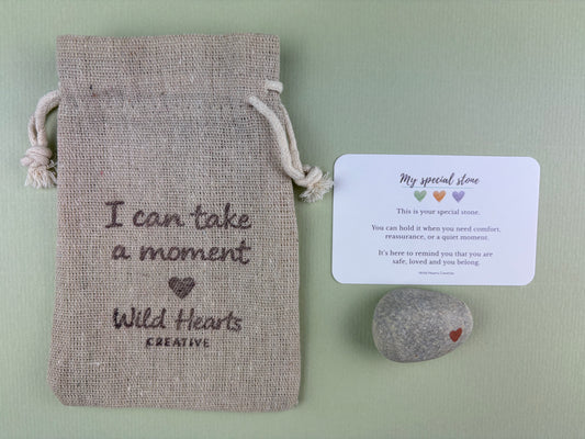 Comfort stone for children with branded drawstring pouch and reassurance card, designed to encourage identity, focus, calm, belonging and emotional support.