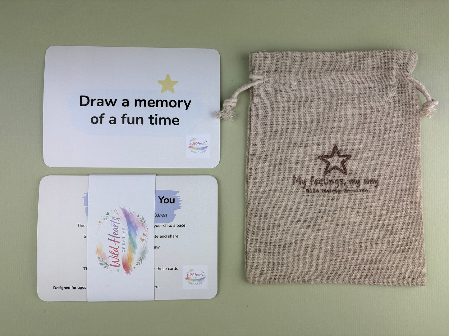 Close up of Remembering Grief Comfort and Support Cards, with My Feelings My Way Drawstring Bag by Wild Hearts Creative, helping children process bereavement