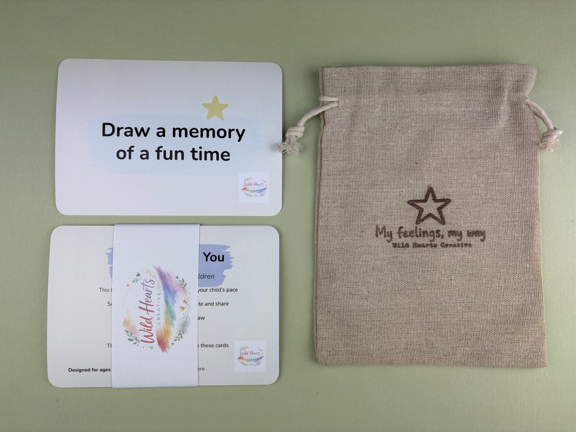 Close up of Remembering Grief Comfort and Support Cards, with My Feelings My Way Drawstring Bag by Wild Hearts Creative, helping children process bereavement