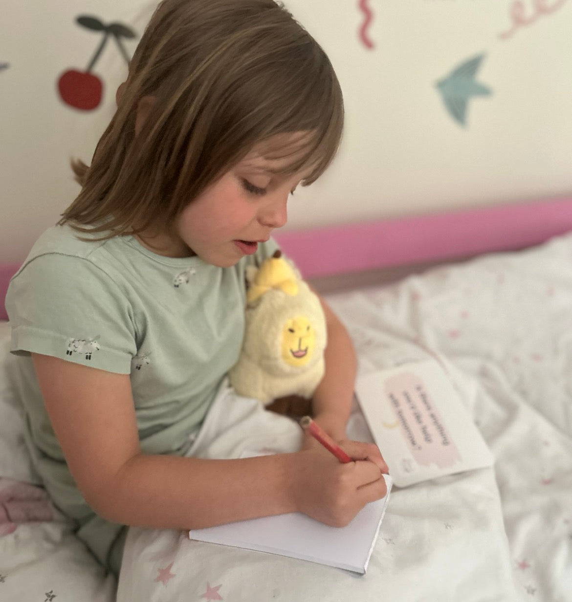 Child reading affirmation card at bedtime, Rest your worries, wild hearts, sketching anxiety through creativity