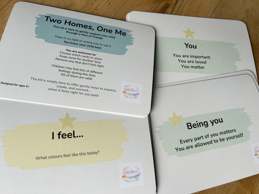 Emotional educational cards with affirmations and self-esteem messages on a wooden surface for children who have coparenting circumstances, divorced parents, by Wild Hearts Creative 
