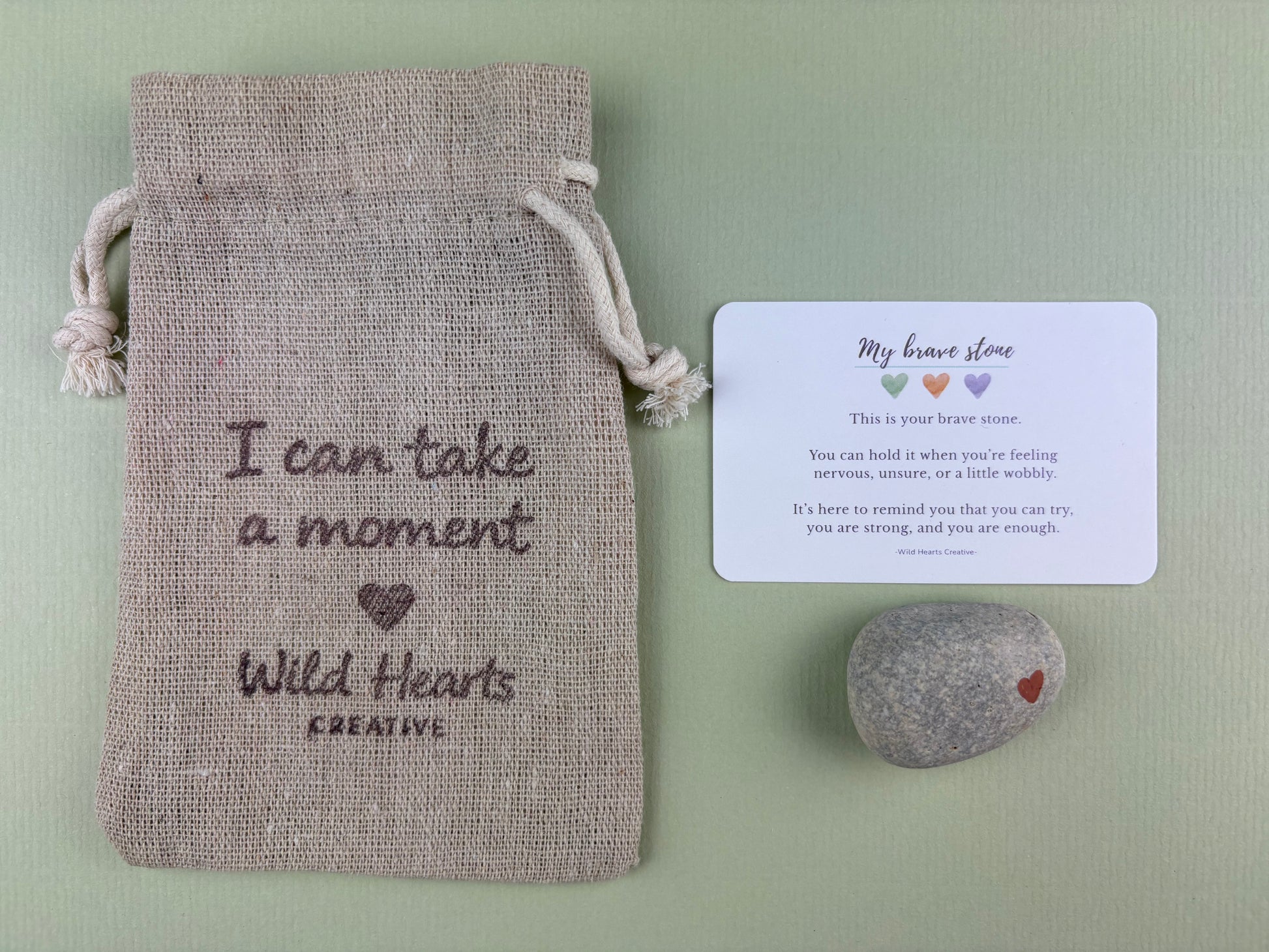 Comfort stone for children with branded drawstring pouch and reassurance card, designed to encourage calm, bravery and emotional support.