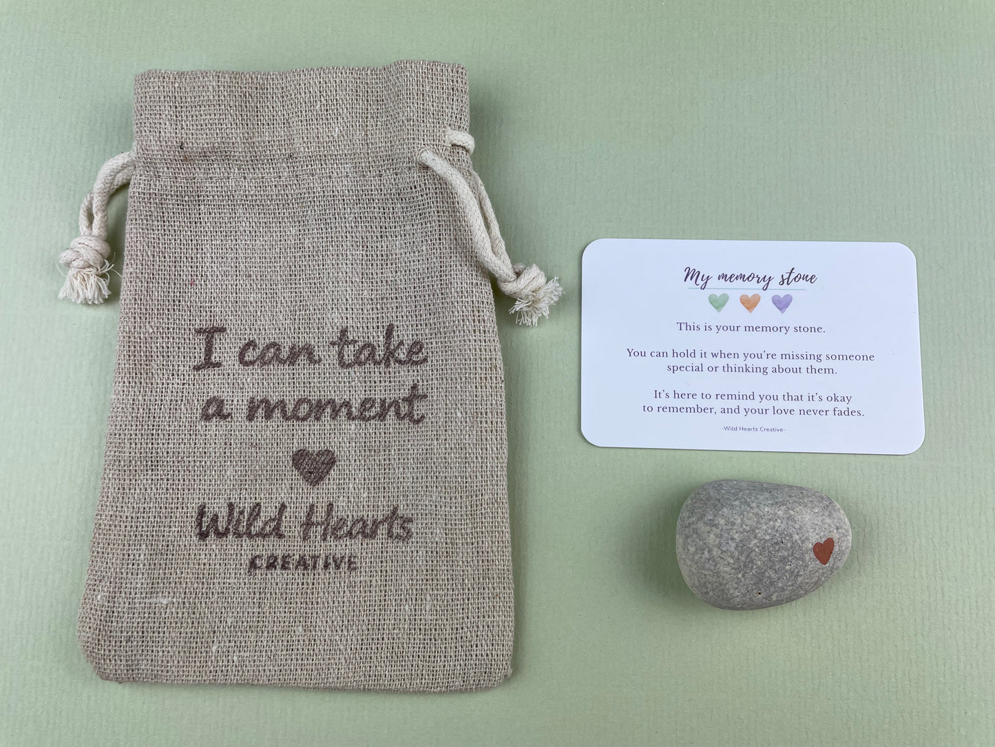 Wild Hearts Creative memory stone with a drawstring pouch and reassurance card, designed to help children remember loved ones and feel comforted while processing grief and loss.